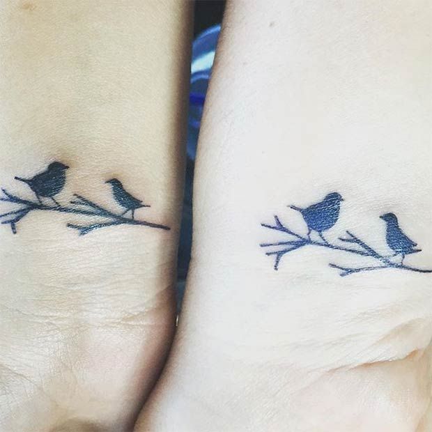 Birds on the tree branch tattoo