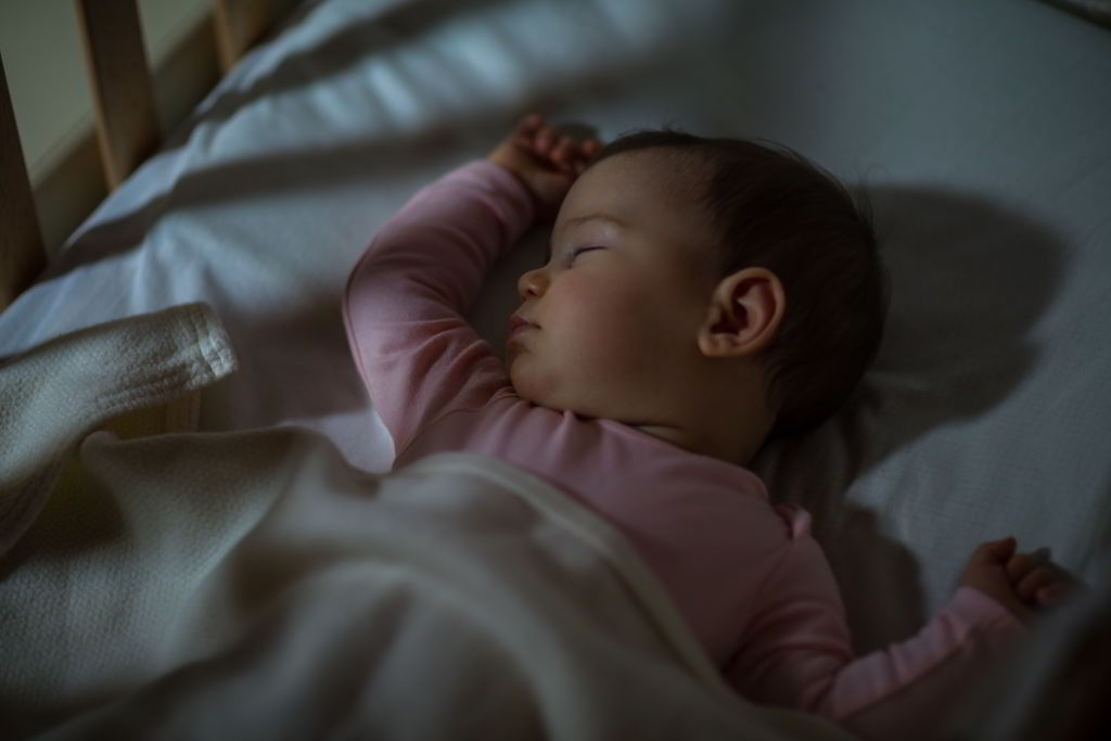 how to help baby sleep tightly through the night