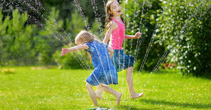 kids in sprinkler